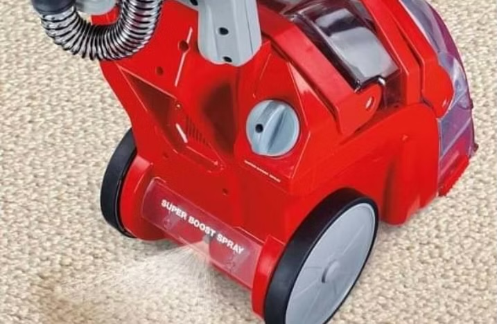 Professional carpet cleaning machine in action
